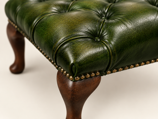 Antique Green Chesterfield Queen Anne Footstool, close-up of the buttoned top and cabriole leg