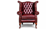 Chesterfield Tudor High-Back Armchair in Antique Rosso leather